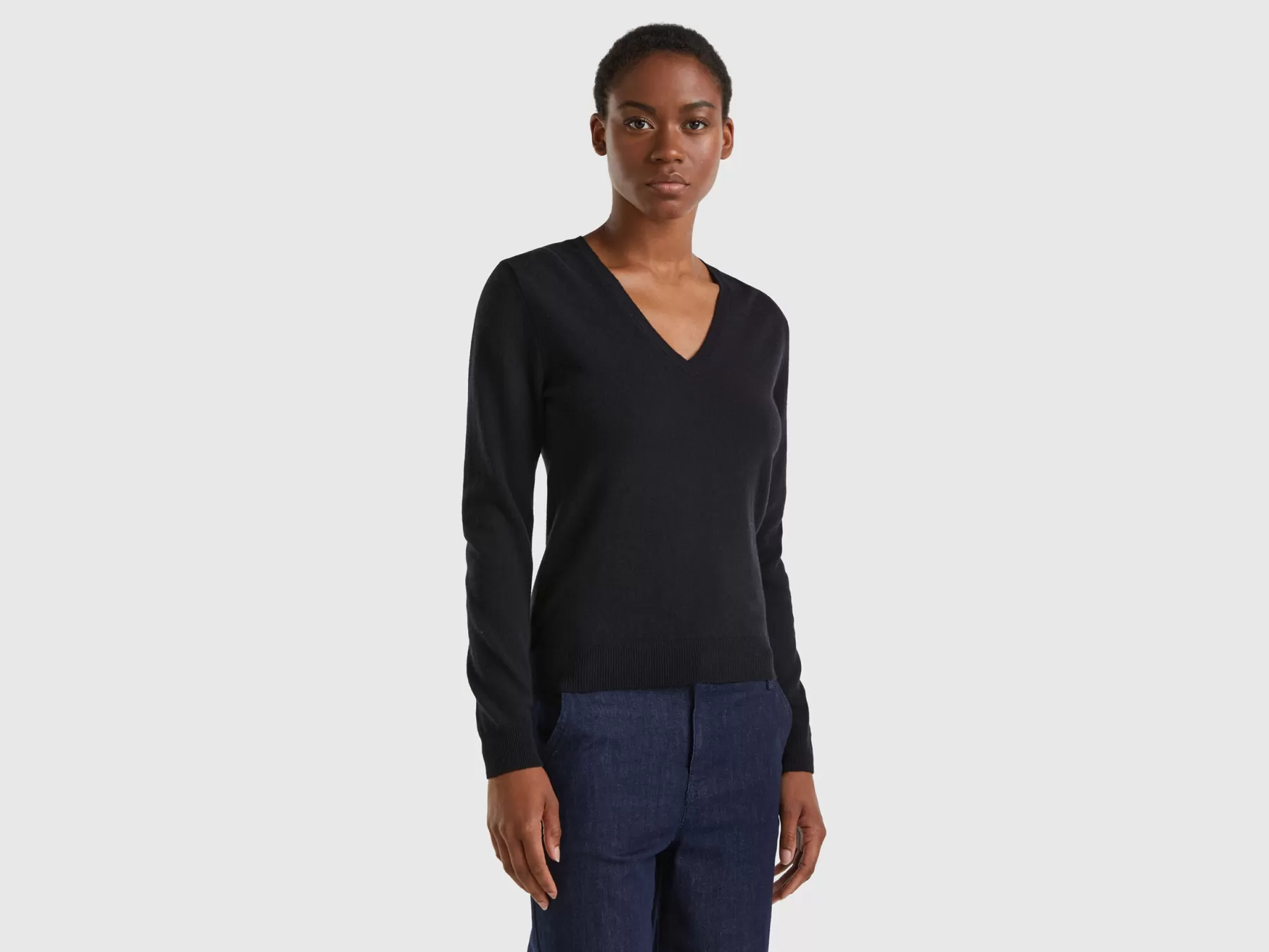 Benetton Maglia Con Scollo A V Nera In Pura Lana Merino Nero Outlet