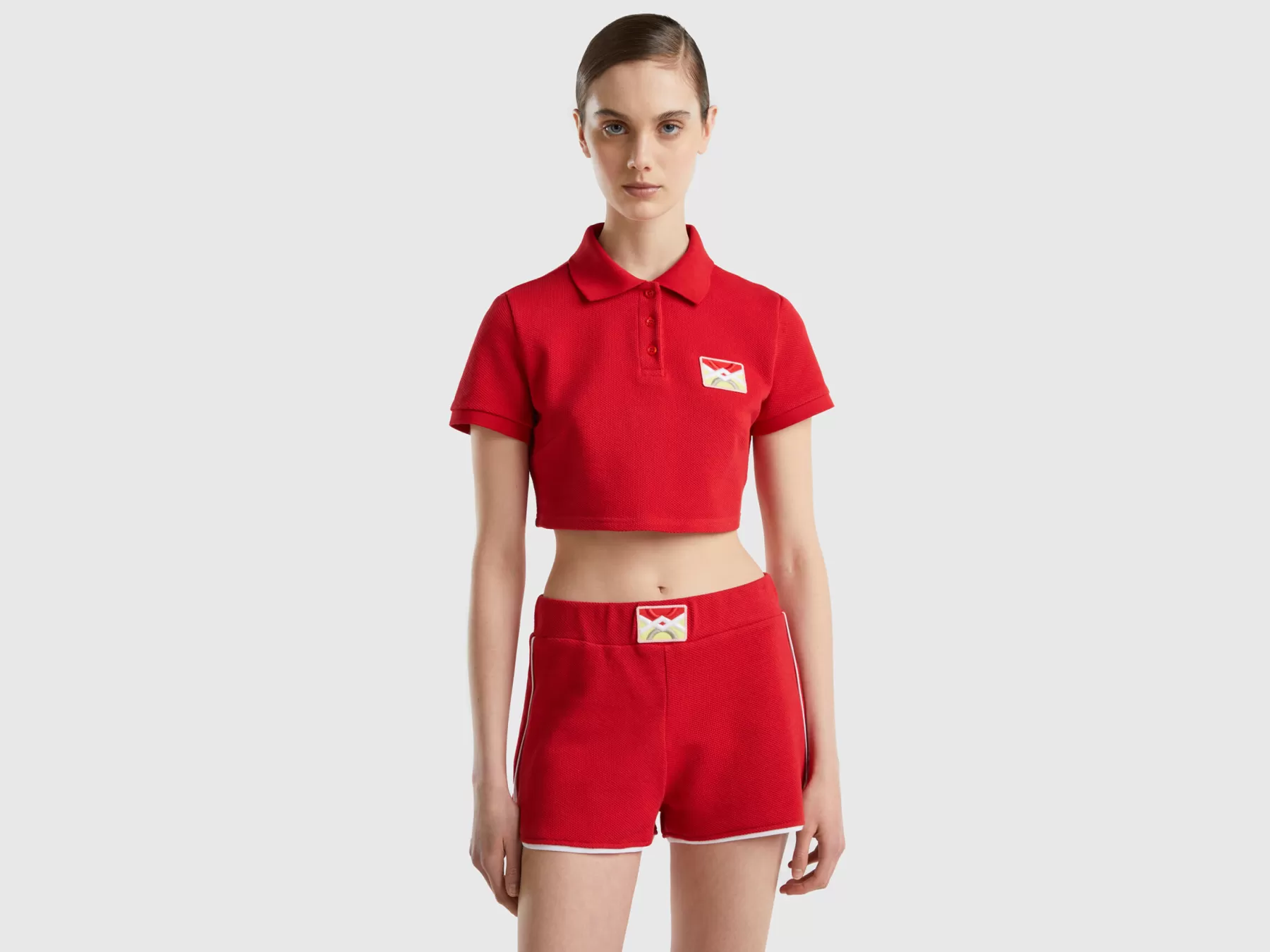 Benetton Polo Cropped Rossa Con Patch Logo Rosso Cheap