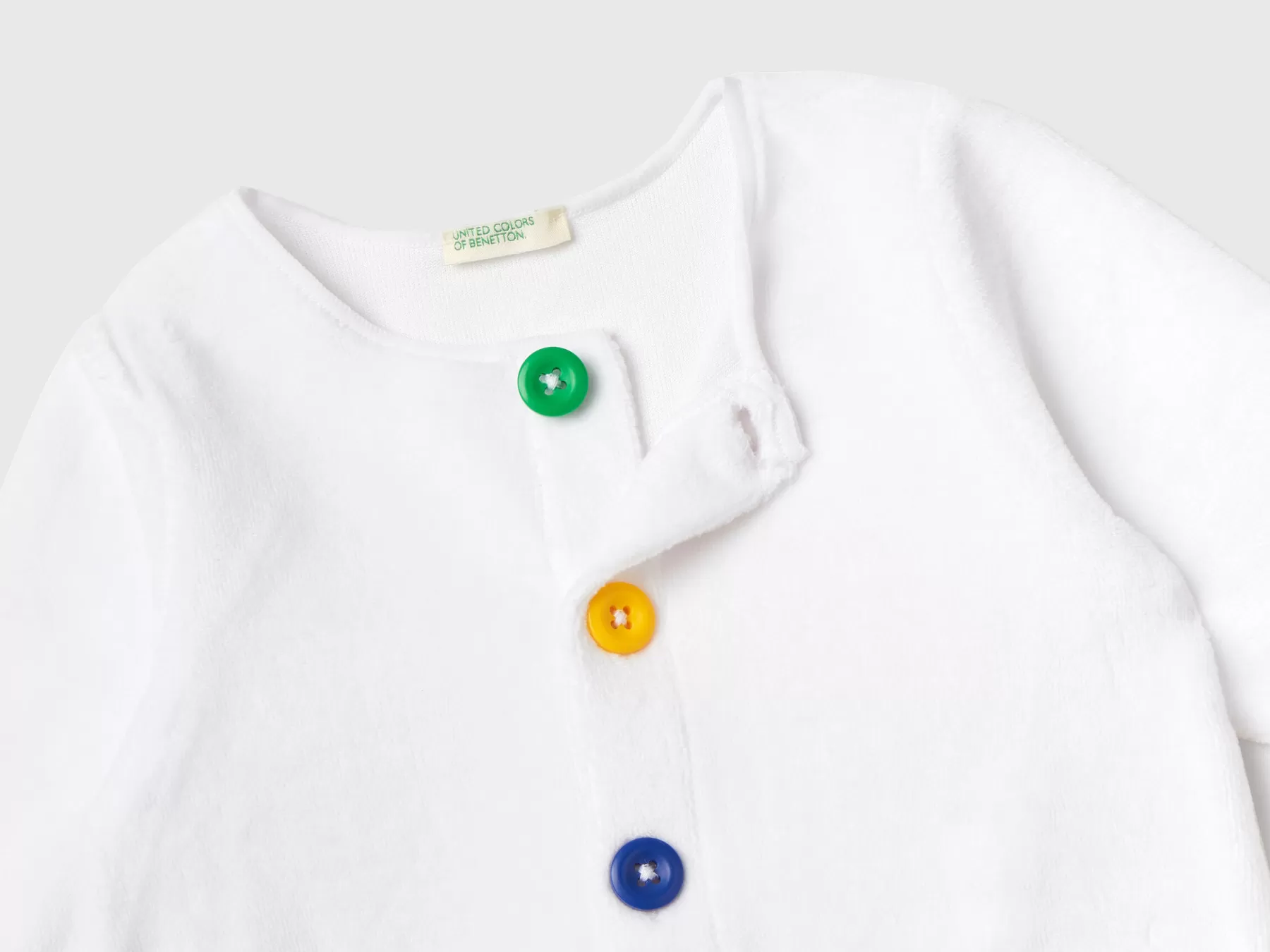 Benetton Tutina In Ciniglia Con Taschini Bianco Fashion